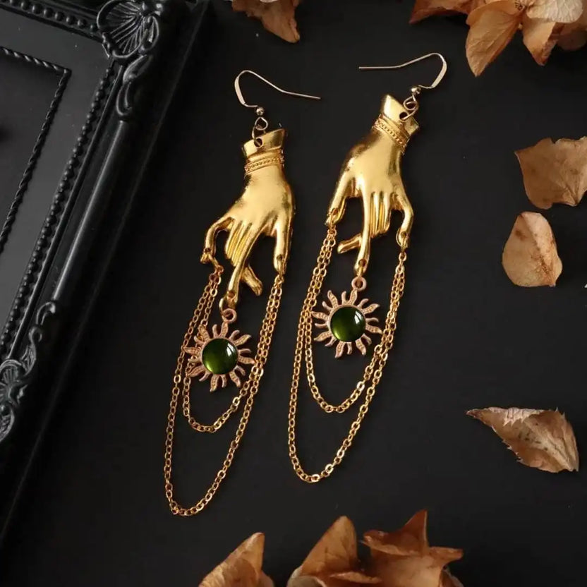 Pendientes de cadena con sol dorado