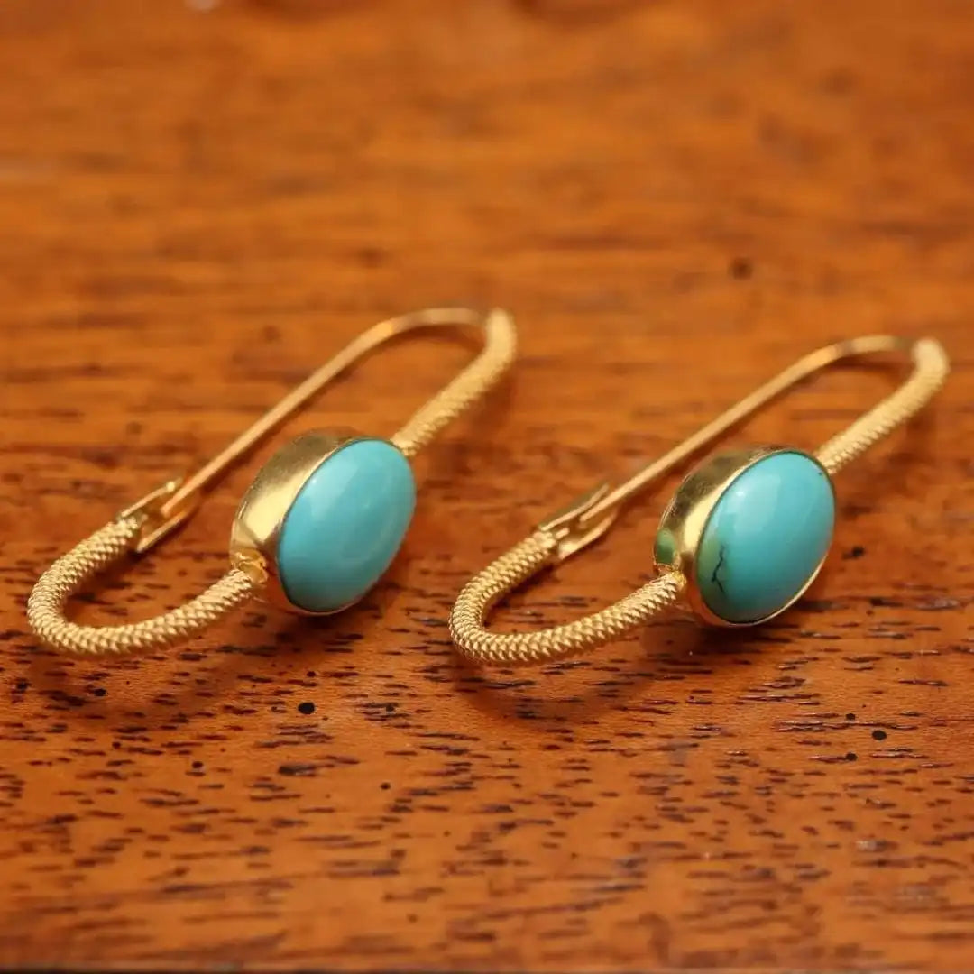 Pendientes atemporales de oro, turquesa, perla y piedra lunar