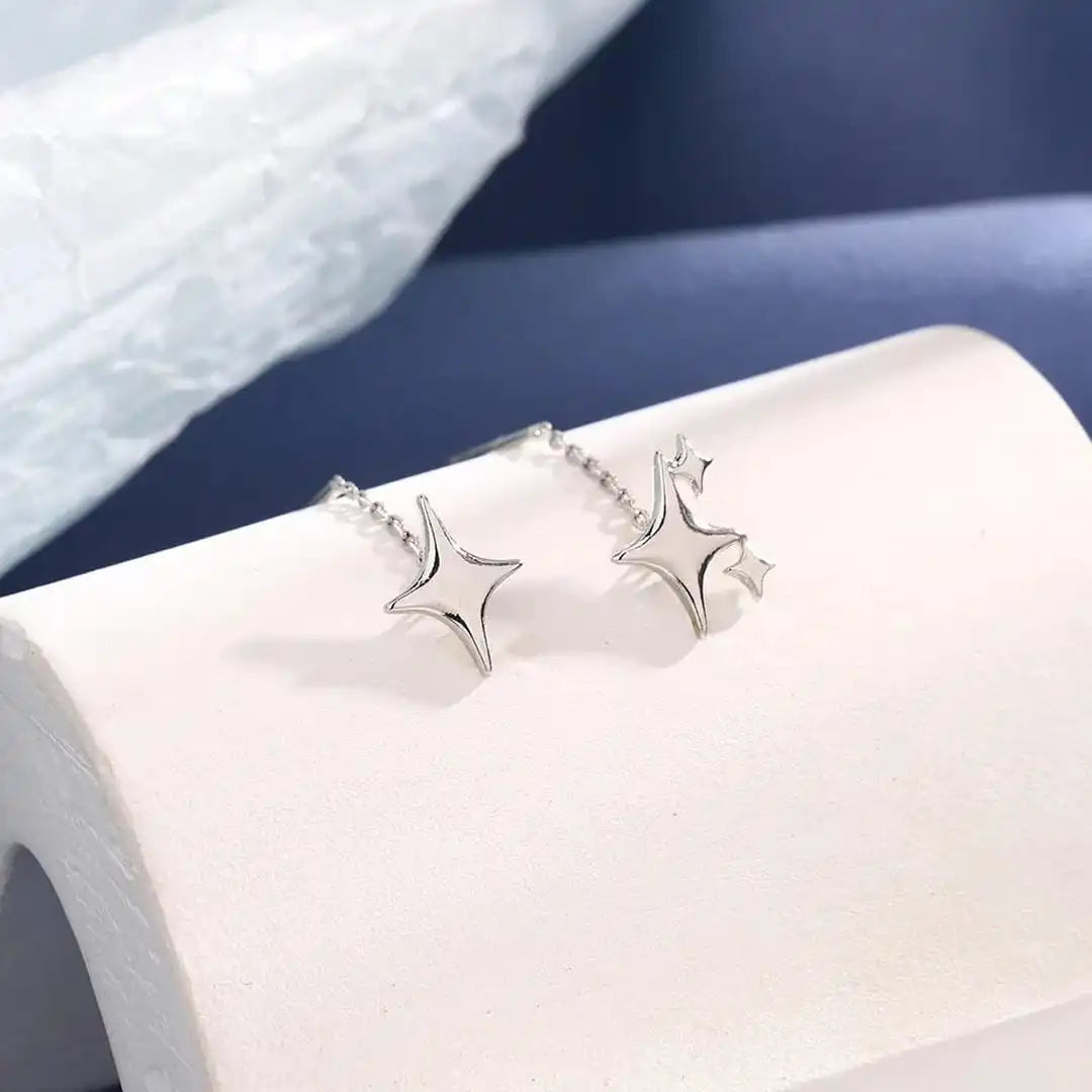 Pendientes de plata de ley con estrella dorada y cadena