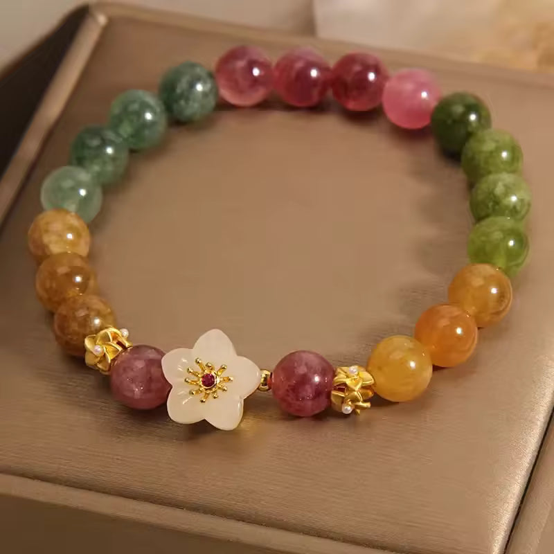 Pulsera radiante de jade con cuentas florales