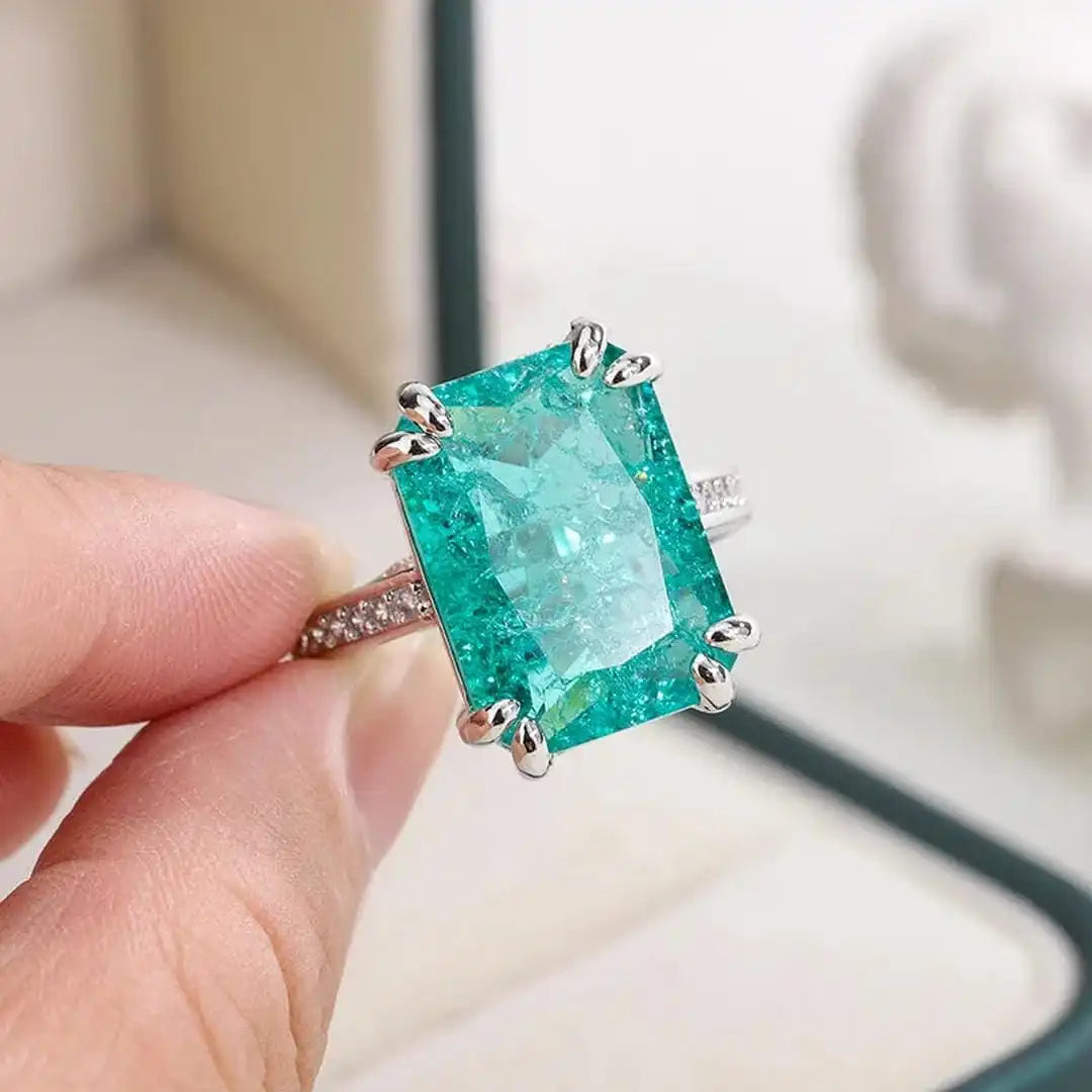 Anillo de moissanita azul verdosa exquisito