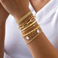 Set de pulseras apilables doradas con perlas – imagen 2