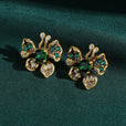 Pendientes dorados de mariposa esmeralda con cristal – imagen 2