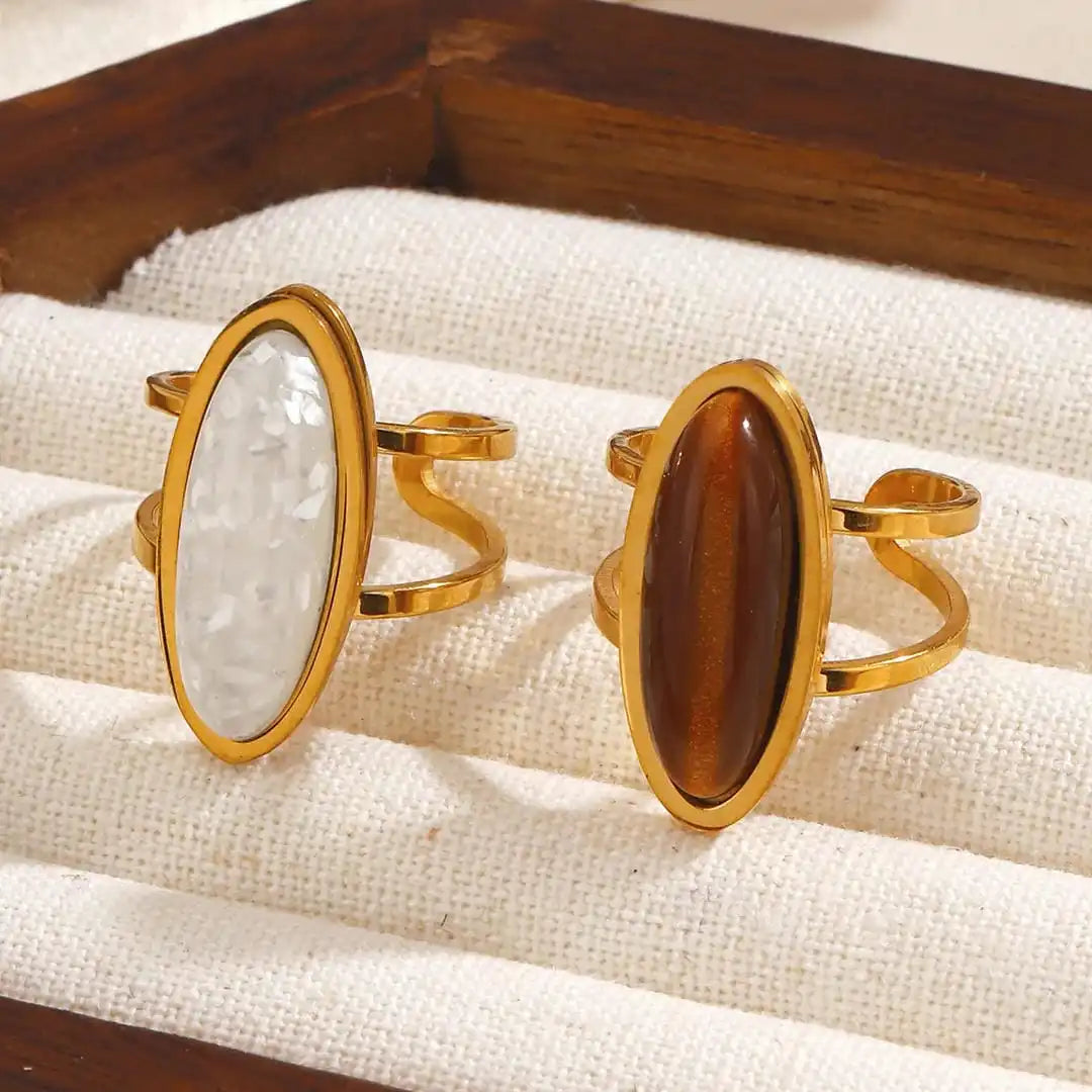 Anillo doble de oro con cabujón ovalado
