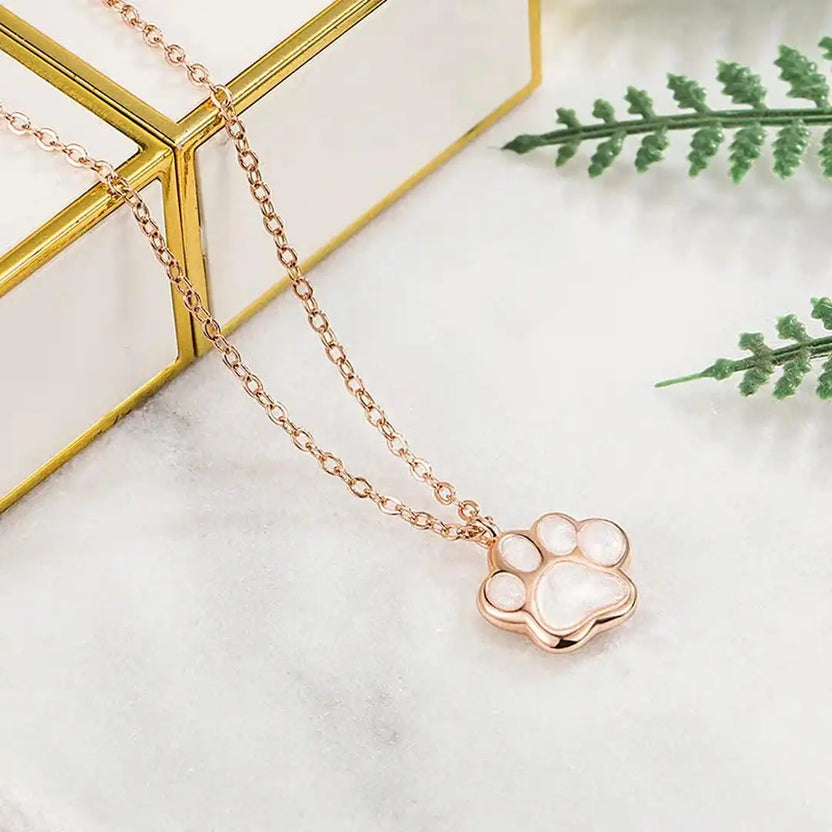 Collar con dije de huella en oro rosa