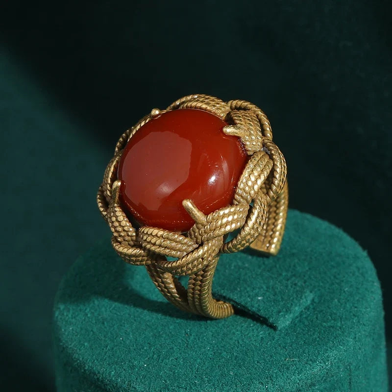 Anillo redondo de ágata en trenzado dorado