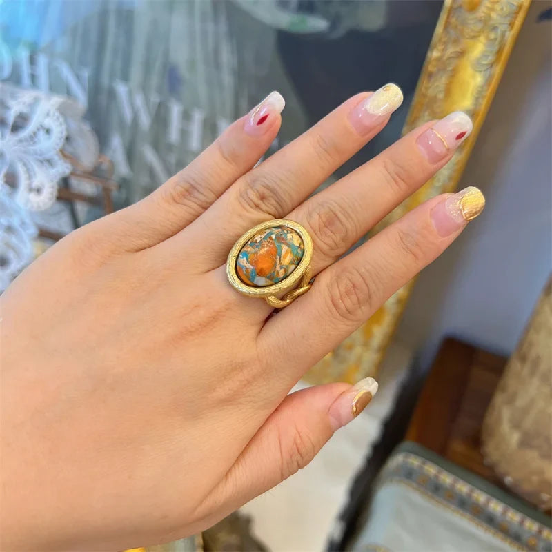 Anillo náutico radiante de turquesa y oro – imagen 3