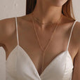 Collar largo de doble capa con borlas y cuentas doradas – imagen 2