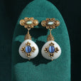 Pendientes royal de perla blanca en forma de gota