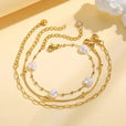 Set de pulseras apilables doradas con perlas – imagen 3