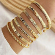 Set de pulseras doradas abiertas estilo resort