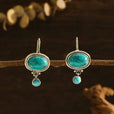 Pendientes minimalistas de flor plateada