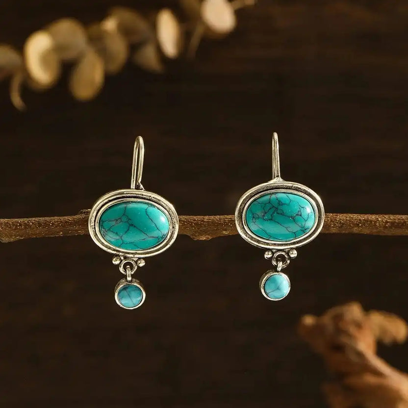 Pendientes minimalistas de flor plateada