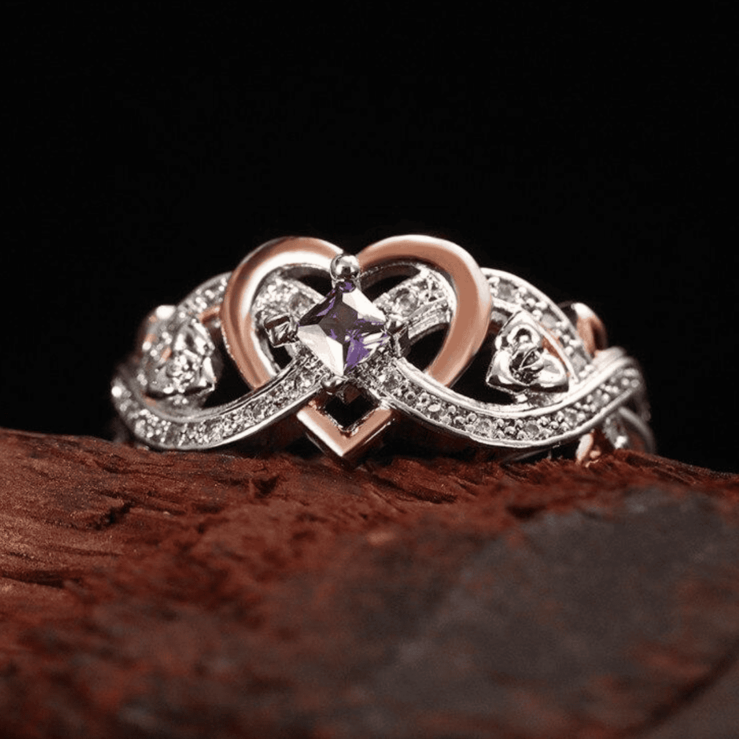 Anillo de promesa de amatista con corazón e infinito