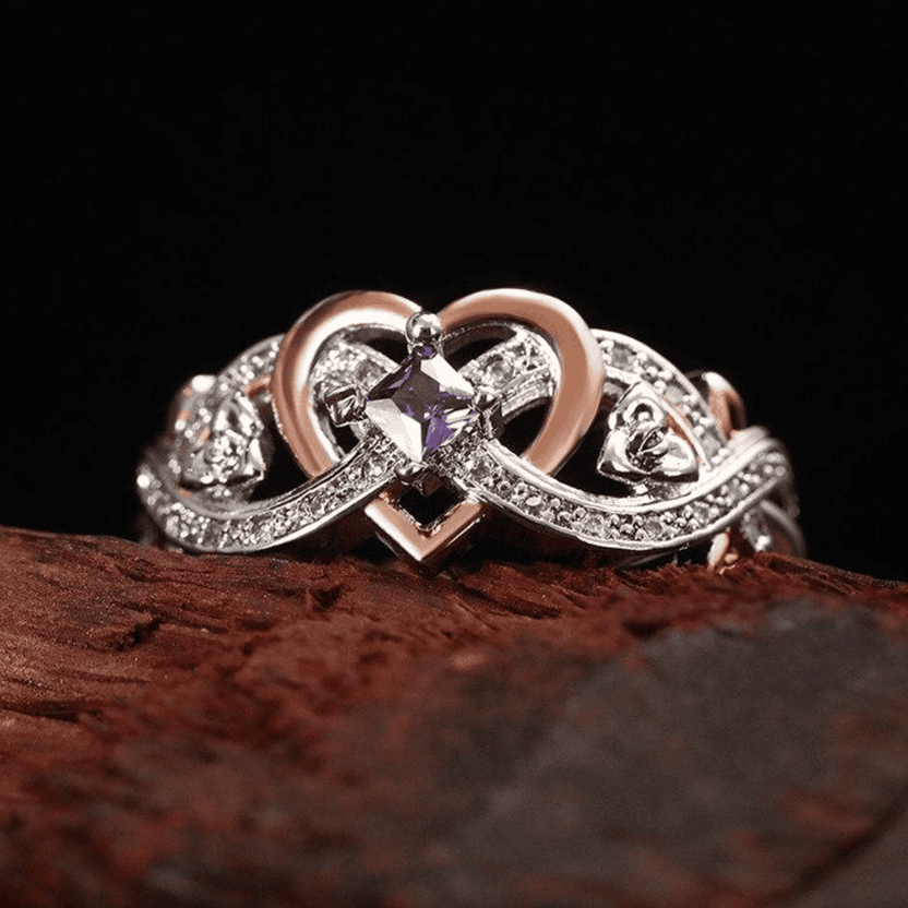 Anillo de promesa de amatista con corazón e infinito