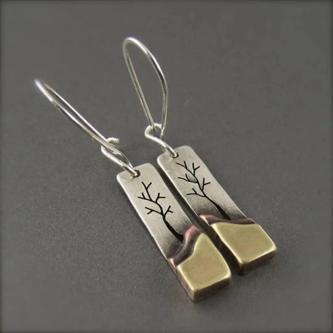 Pendientes largos vintage con hoja y luna