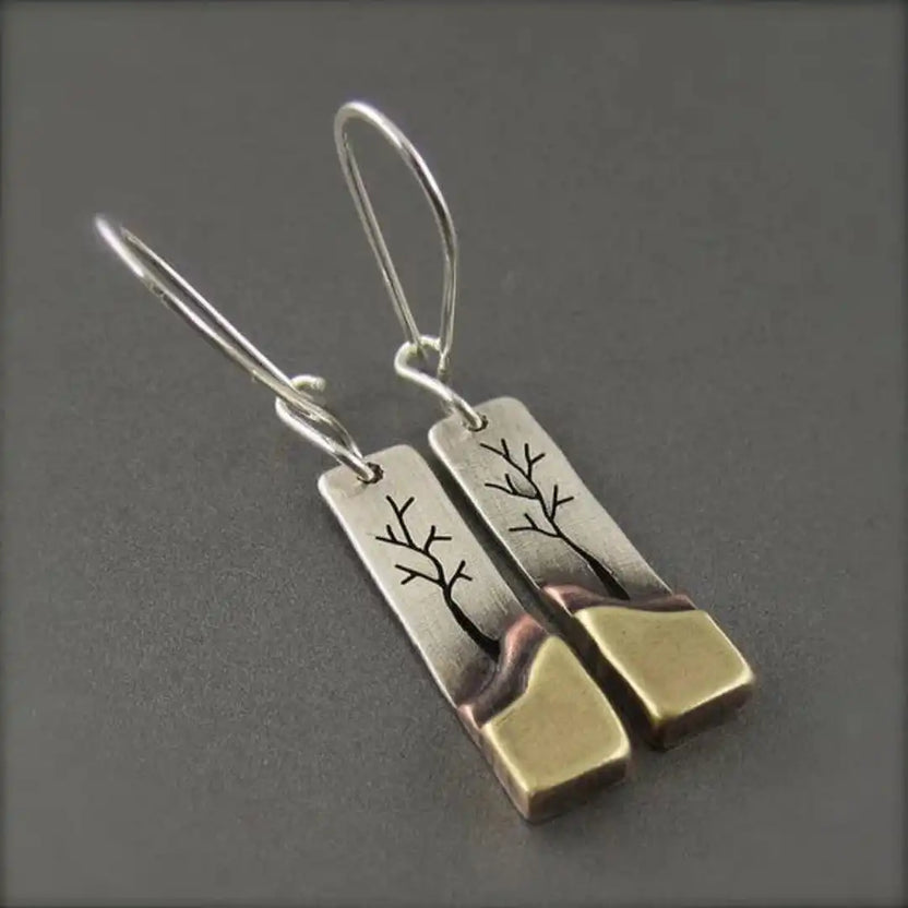 Pendientes largos vintage con hoja y luna
