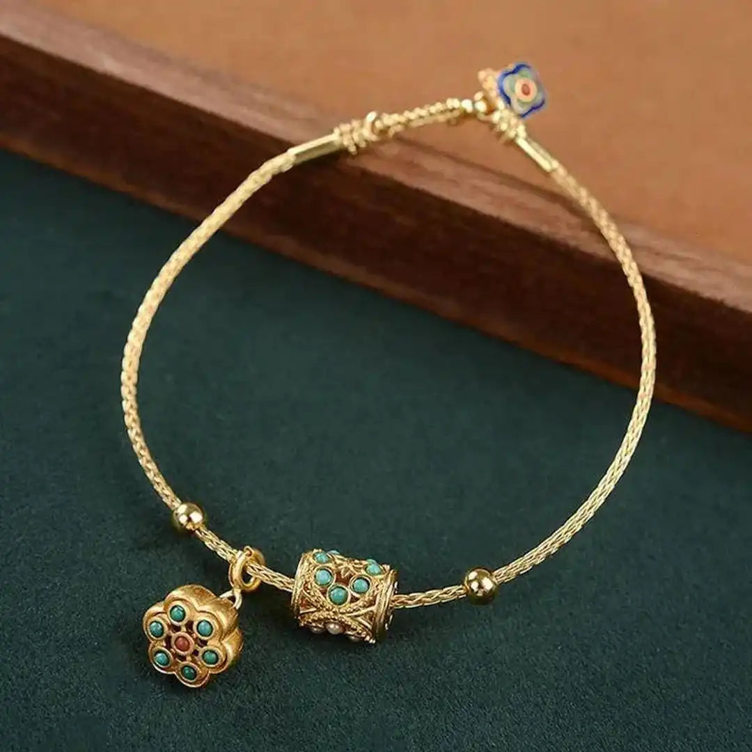 Pulsera loto de turquesa en oro antiguo