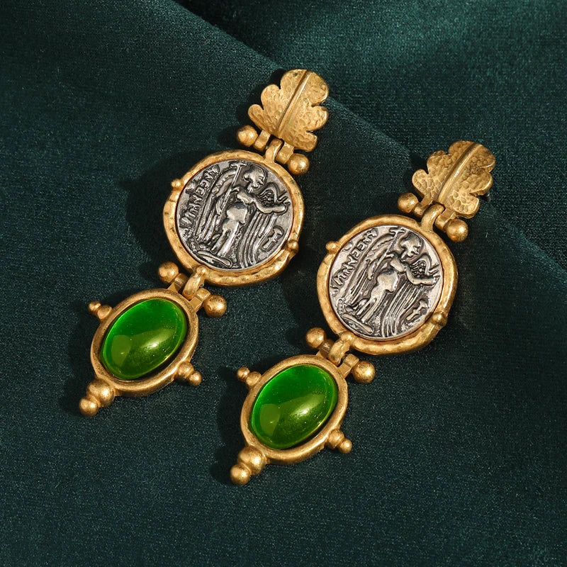 Pendientes colgantes ovalados con relieve artístico