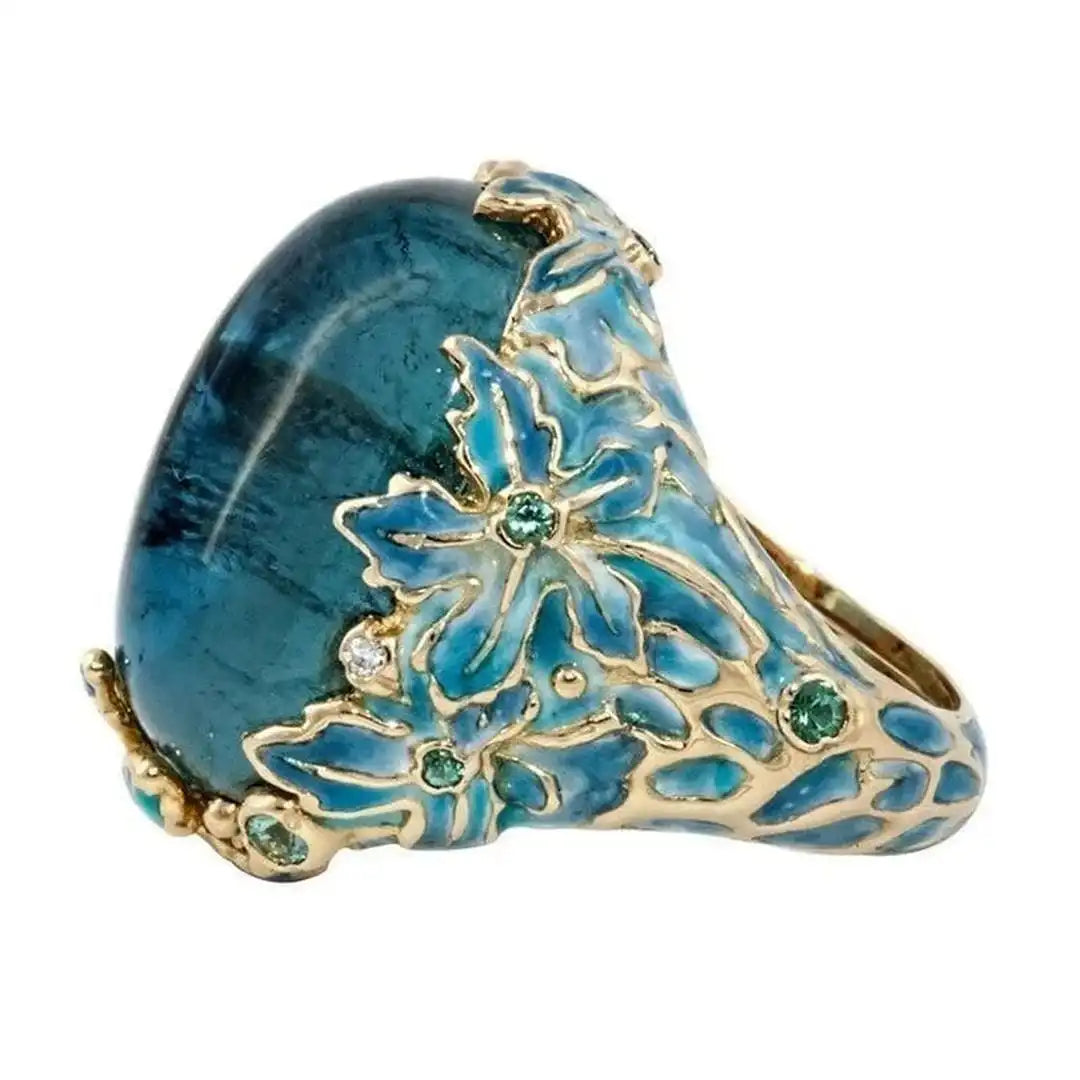 Anillo elegante de oro con flor y piedra azul – imagen 3