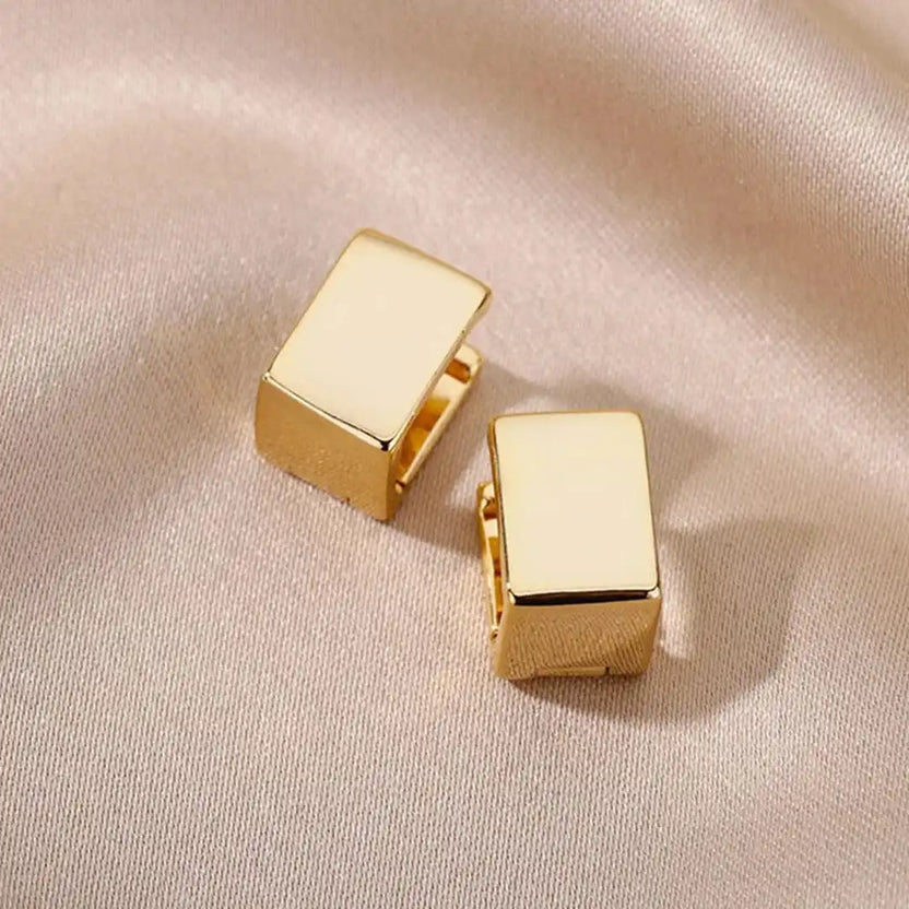 Pendientes geométricos cuadrados dorados