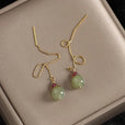 Pendientes de oro de gota con perla de jade