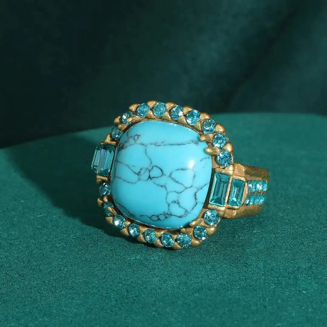 Anillo dorado con turquesa y circonita – imagen 2