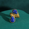 Anillo dorado con nudo de gota esculpido – imagen 2