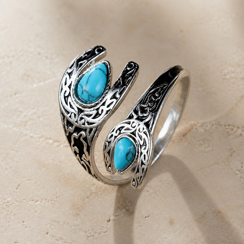 Anillo opulento de plata con turquesa