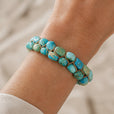 Pulsera dorada trenzada con piedra turquesa – imagen 2