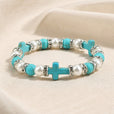 Pulsera de cuentas turquesa con cruz