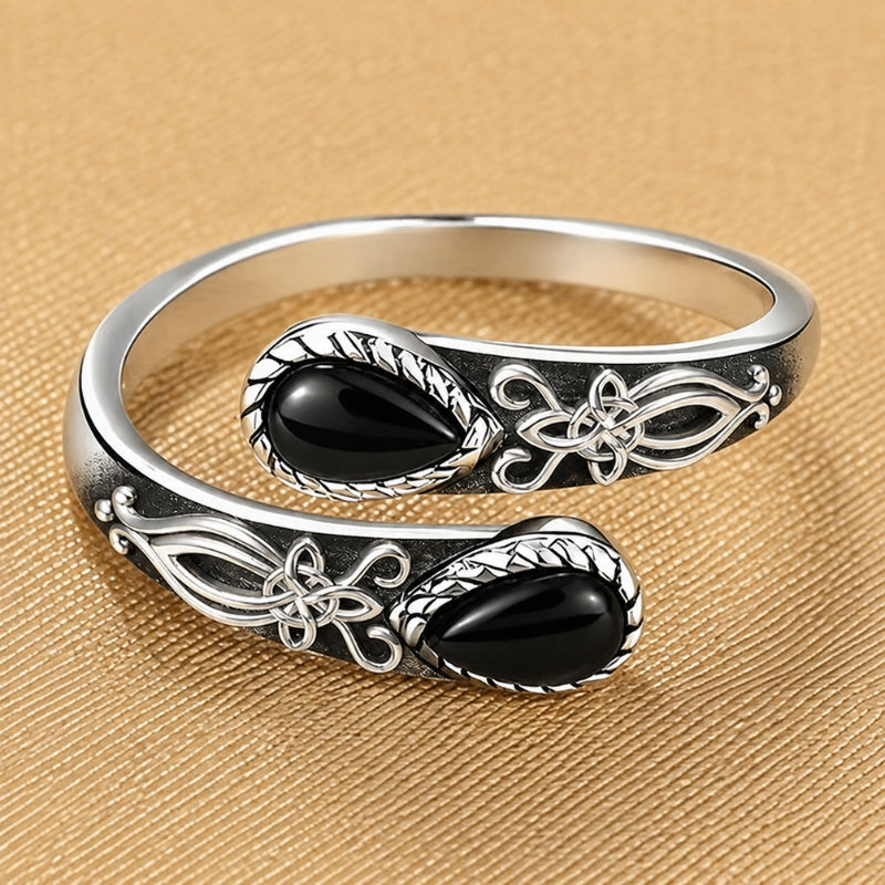 Anillo floral radiante negro