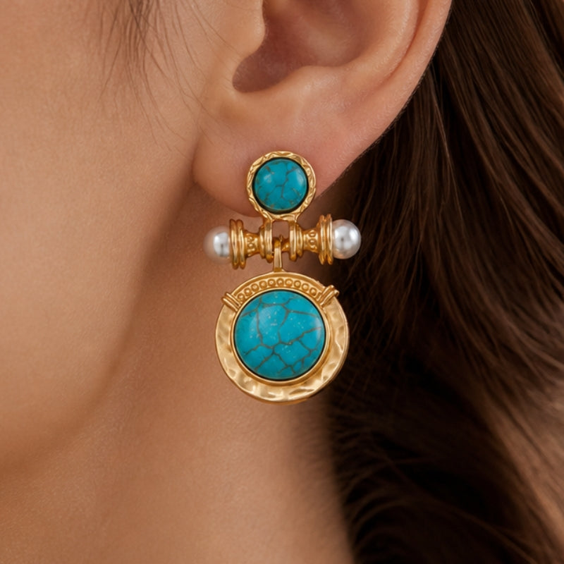 Pendientes exquisitos de turquesa y perla