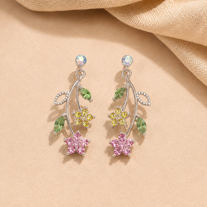 Pendientes florales atemporales de botón