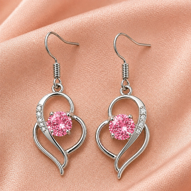 Pendientes llamativos de corazón luminoso