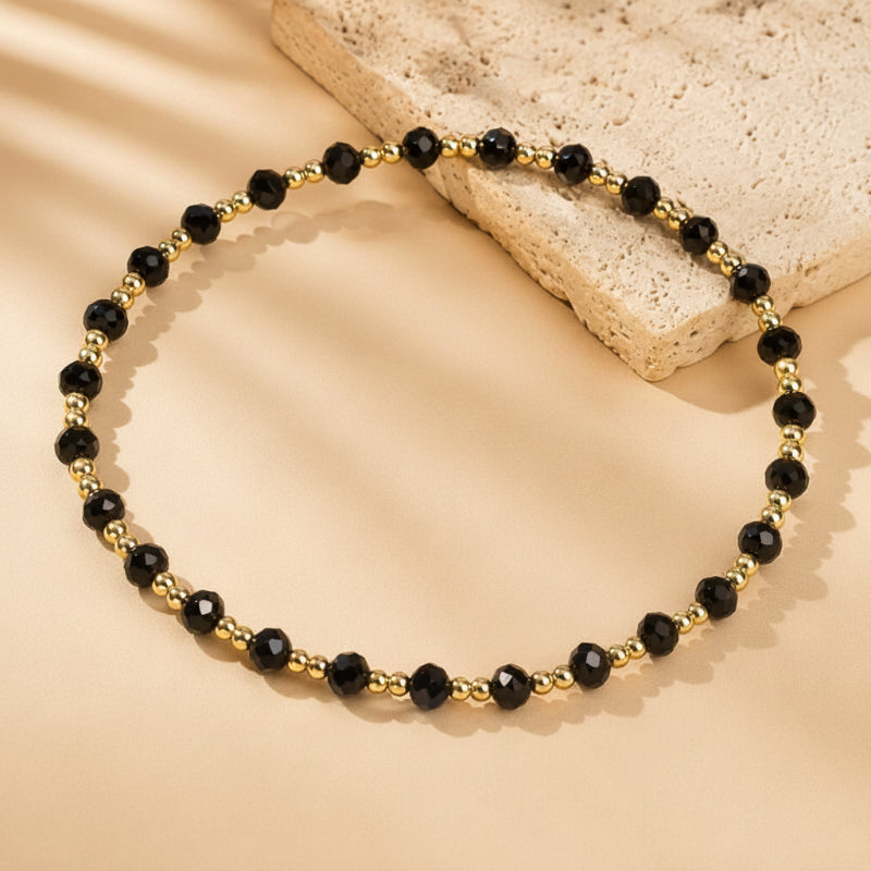 Pulsera trenzada de alta costura con dijes