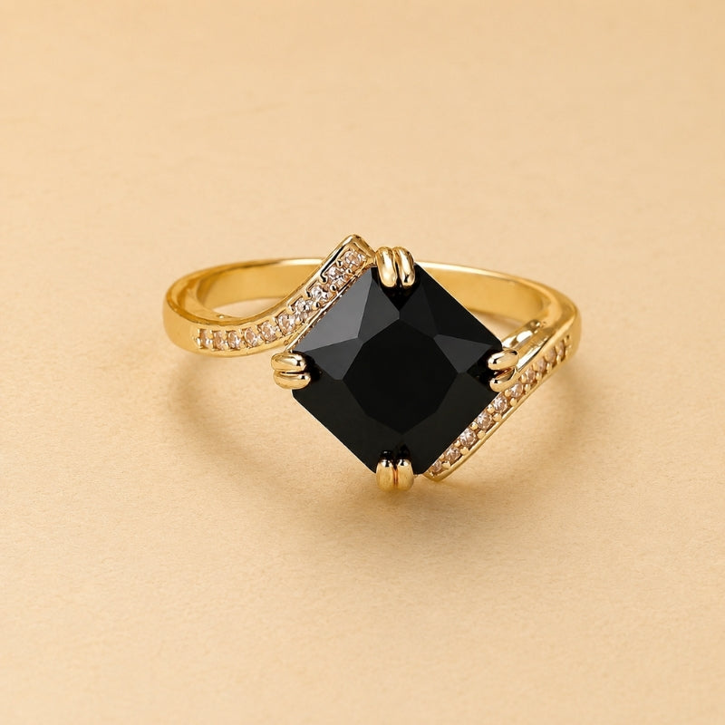 Anillo negro deslumbrante con piedra