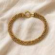 Pulsera dorada noble trenzada – imagen 2