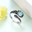 Anillo pulpo de plata con piedra luna azul