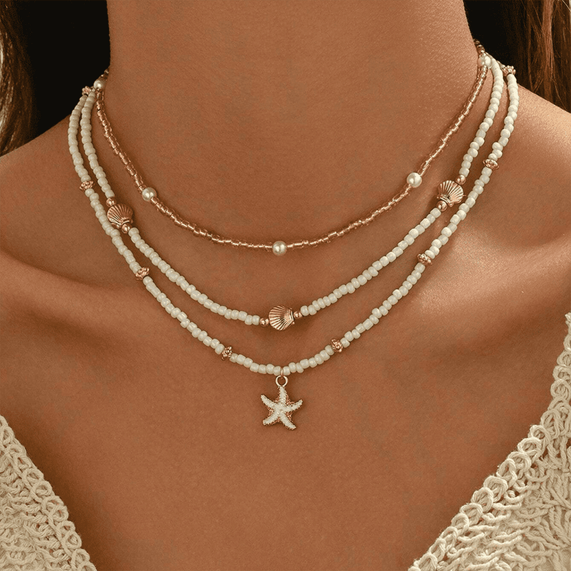 Collar de capas con estrella de mar y cuentas