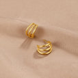 Pendientes triples dorados