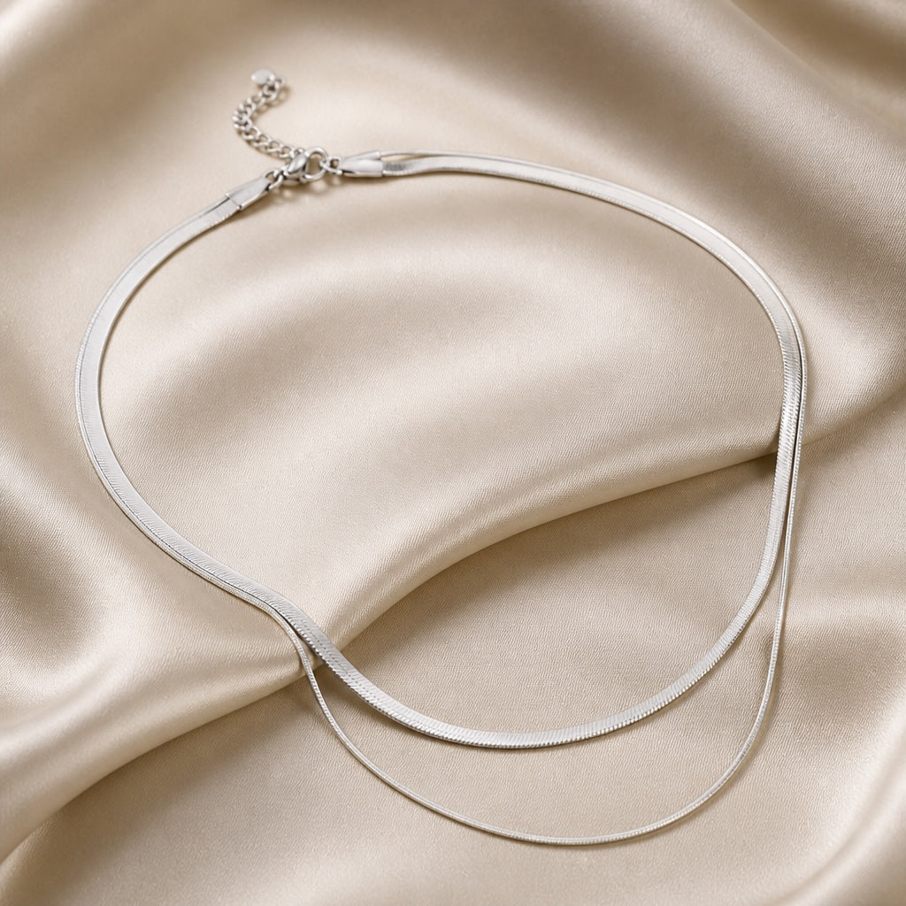Collar doble de serpiente en oro blanco