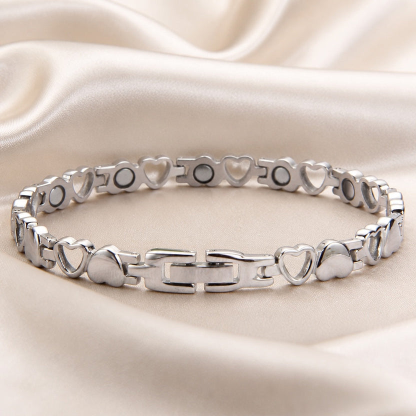 Pulsera elegante de oro blanco con corazón