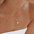 Collar luminoso con gema circular