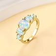 Anillo de oro de 18k con cinco ópalos
