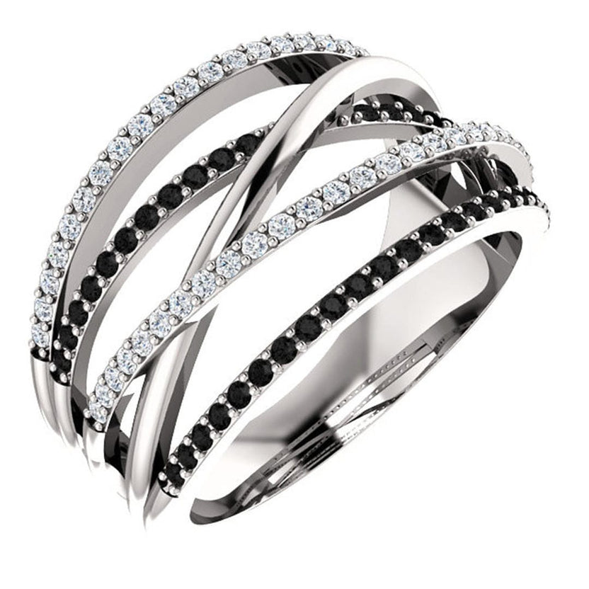 Anillo statement cruzado en blanco y negro