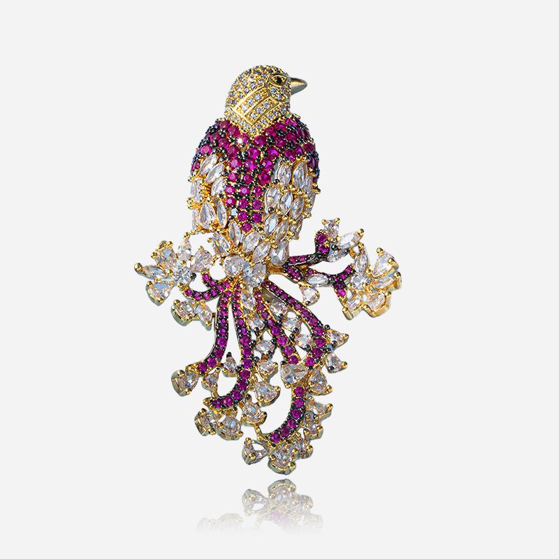 Broche pájaro cantor coronado