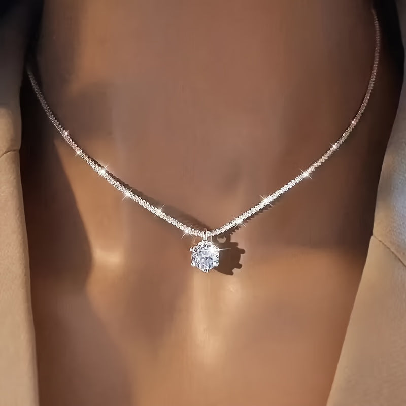 Collar atemporal de oro blanco con incrustaciones de circonita – imagen 2