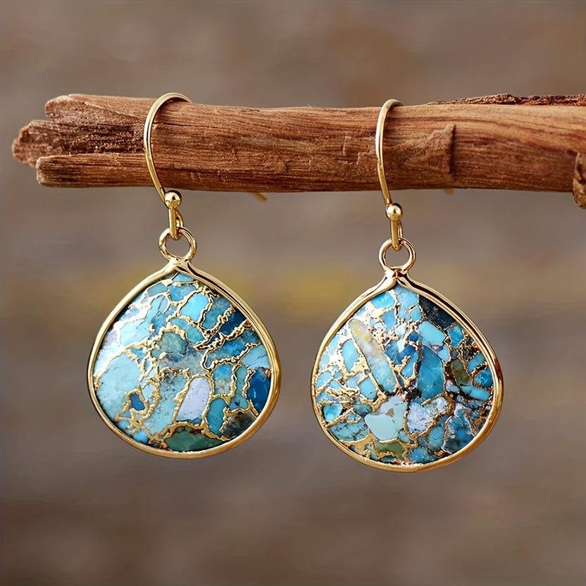 Pendientes bohemios de textura dorada con turquesa