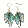 Pendientes largos de resina con alas de mariposa – imagen 5